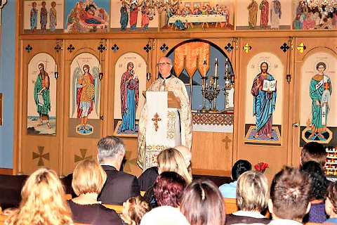 Father Mirone preaching, retirement 2.png