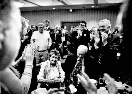 Virginia and Ted at work, 2012 1.png