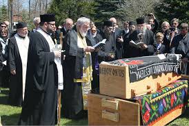 Father Roman Braga burial.jpg