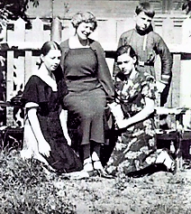 Elena Adamovna and pupils 1936 School garden 1.png