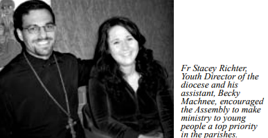 Assembly 2004 Father Stacey and assistant.png