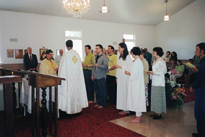 FrPhilipFrLarry StPeter at baptism CS SS.png