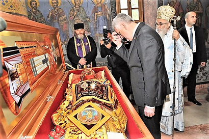 President of Serbia venerats Saint Nikolaj relics 2014 2.png